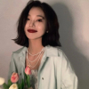 她温柔得像晚风